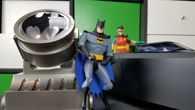 The Bat-signal actually lights up, and the kids stays in the car. I mean, you can take him out, but STAY IN THE CAR, ROBIN.